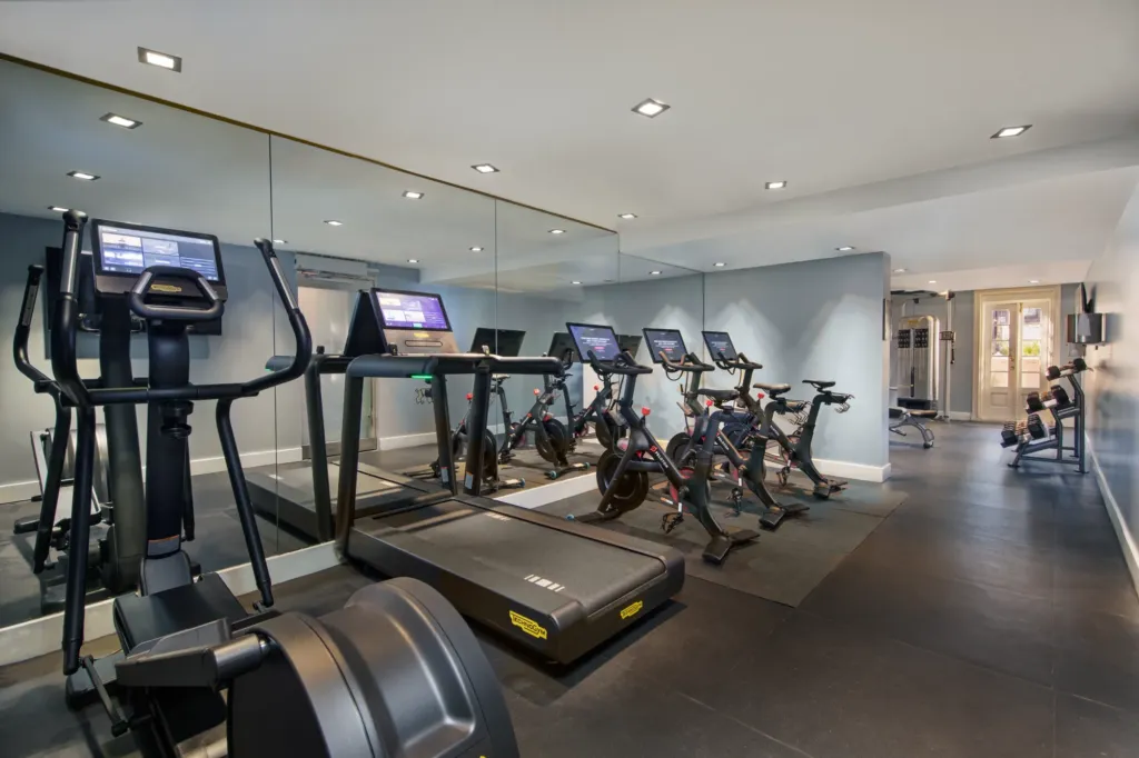 a gym with treadmills and exercise machines